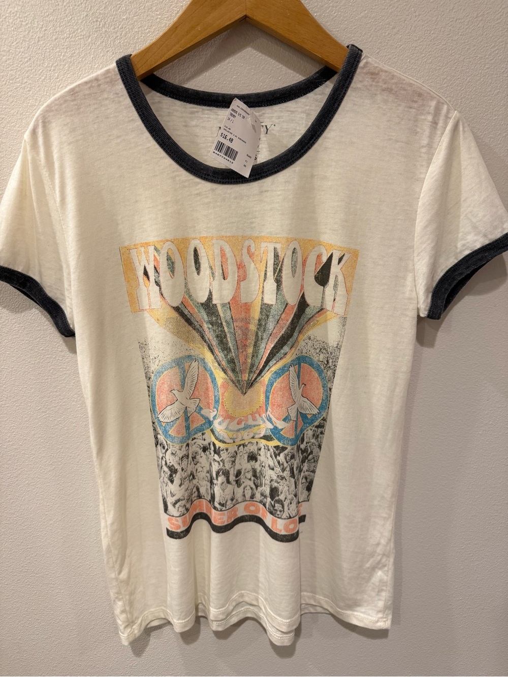 Mighty Fine White Ringer Tee with Black Trim and Multicolor Woodstock Graphic